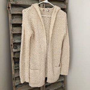 Cream colored cardigan sweater